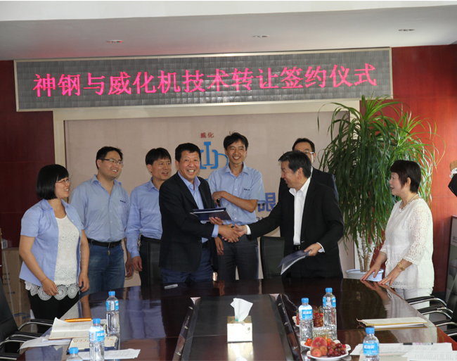 慶祝日本神鋼與威?；瘷C簽訂技術(shù)轉(zhuǎn)讓協(xié)議.jpg